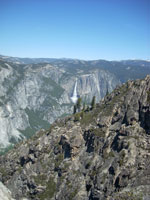 yosemite falls with rocks in foreground